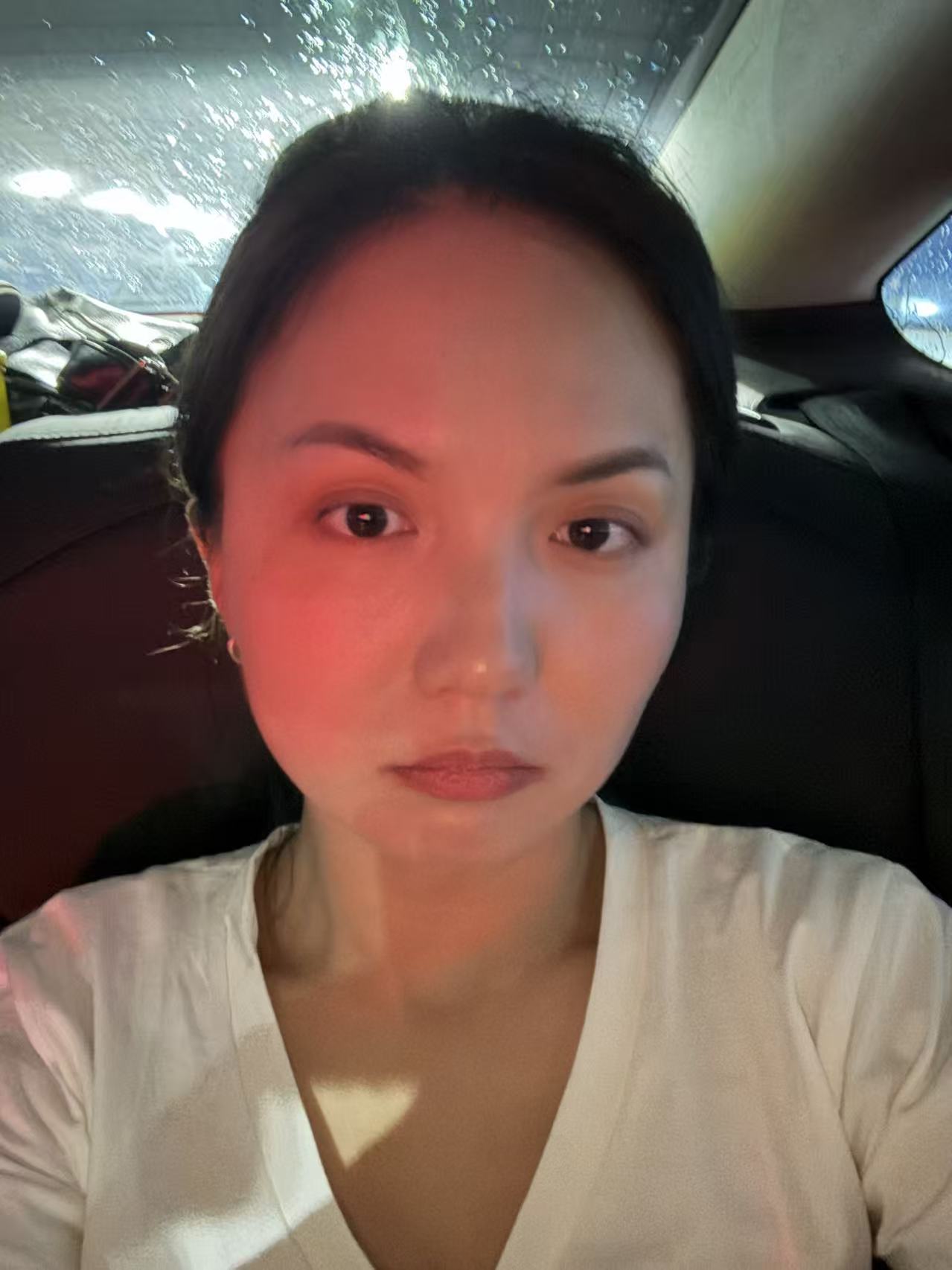 Uploaded selfie with uneven lighting before AI generation
